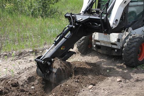 hot to dig a hole with a skid steer|skid steer bucket digging instructions.